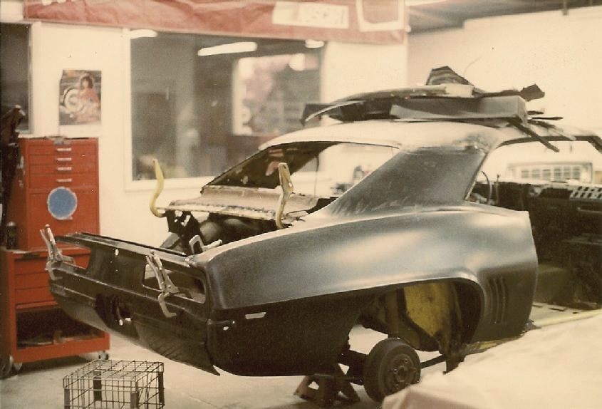 A 1969 Camaro body stripped and in progress in the shop