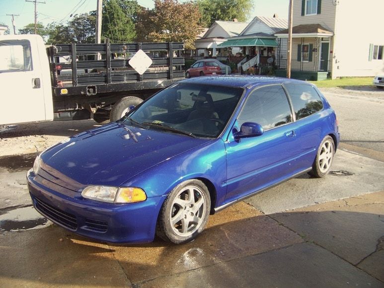 The same Honda Civic repaired and repainted blue