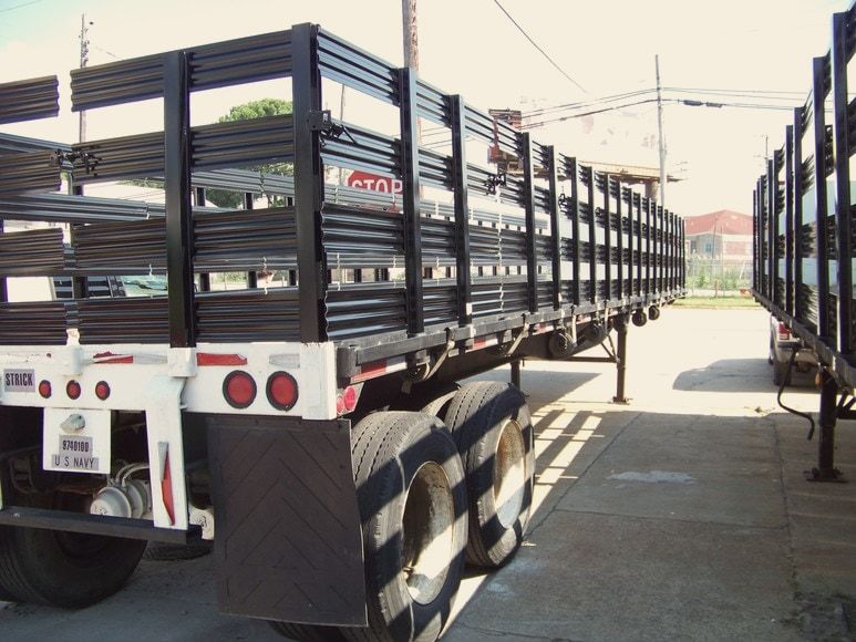 A flatbed trailer with new stake sides and a wood deck