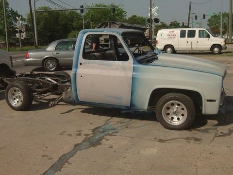 The pickup’s hood and front end in primer